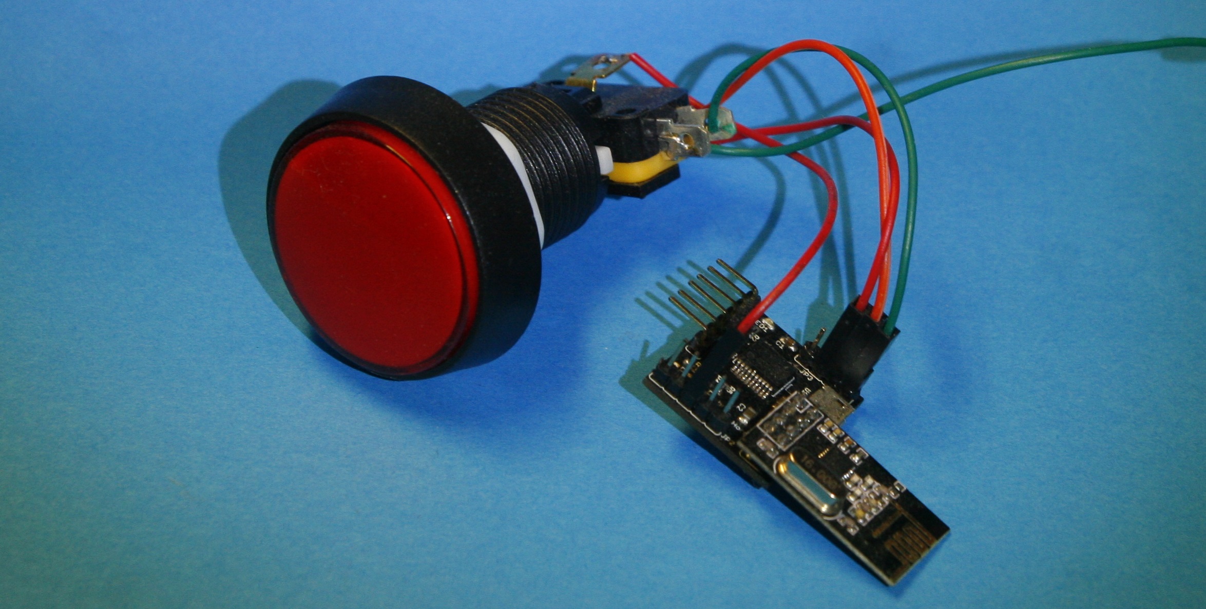 NRF24 board attached to an arcade button